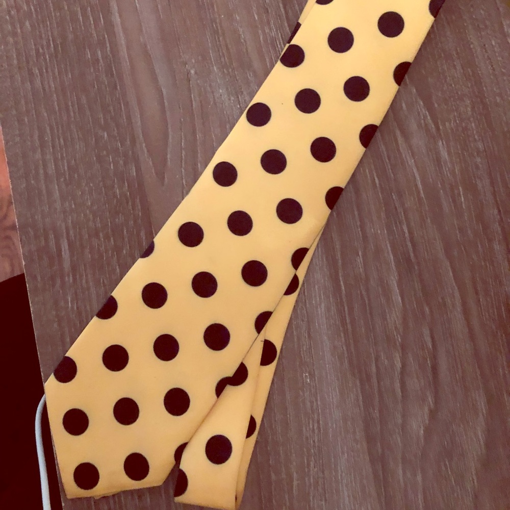 Man with the yellow hat tie